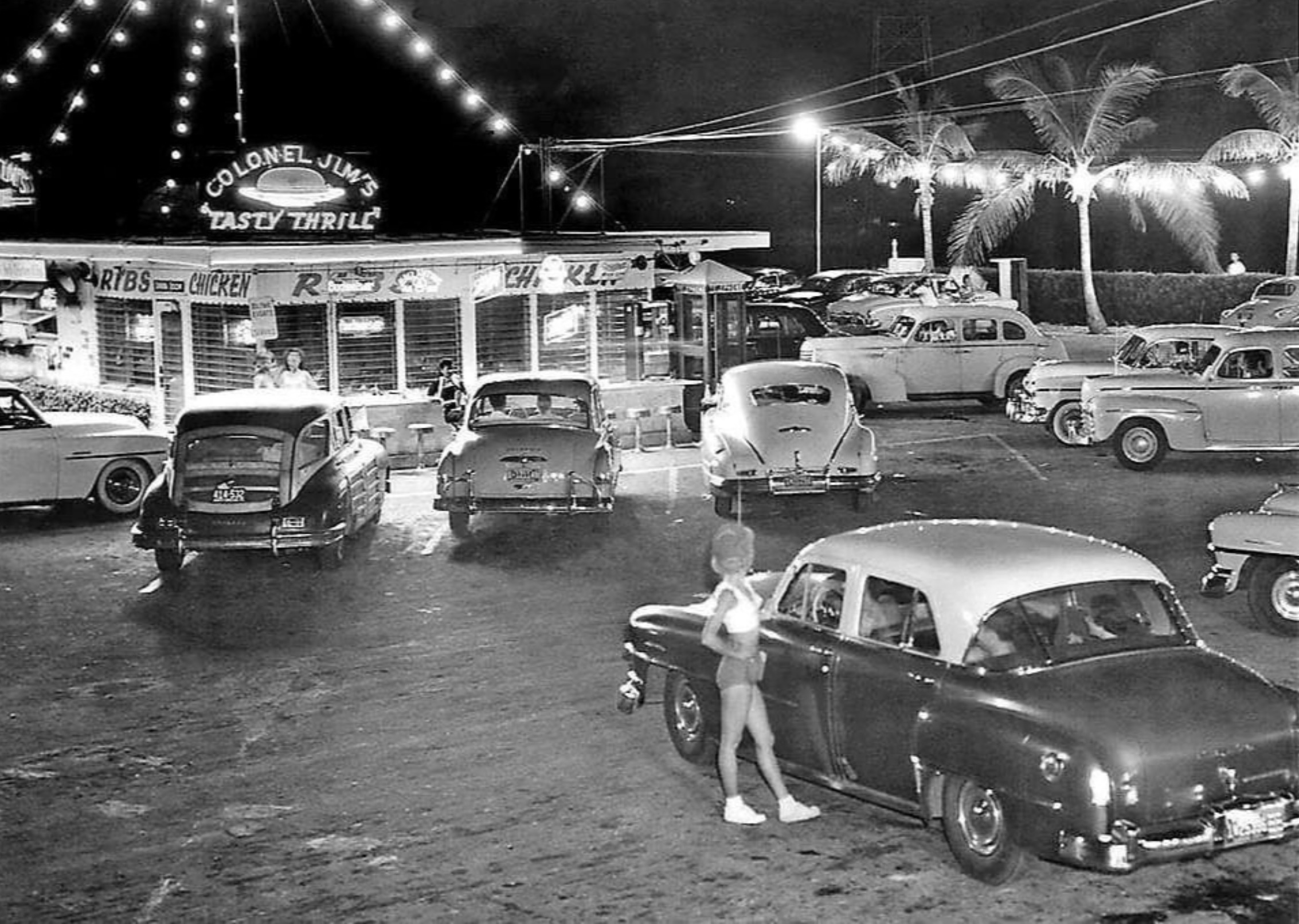 Busy night at Colonel Jim’s Tasty Thrill Drive-In Restaurant, Miami Beach, FL, 1952 